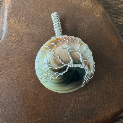 Whisperwood: The Timekeeper || Shiva Shell Pendant
